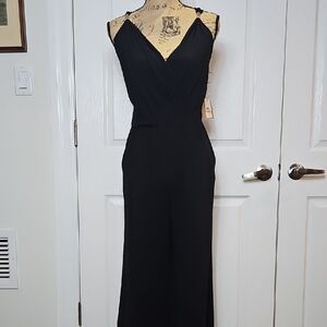 NWT Wide Legged Backless Jumpsuit With Metal Hardware